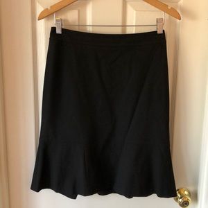 Black pencil skirt with peplum detail at bottom